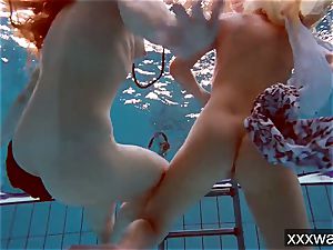 scorching Russian dolls swimming in the pool